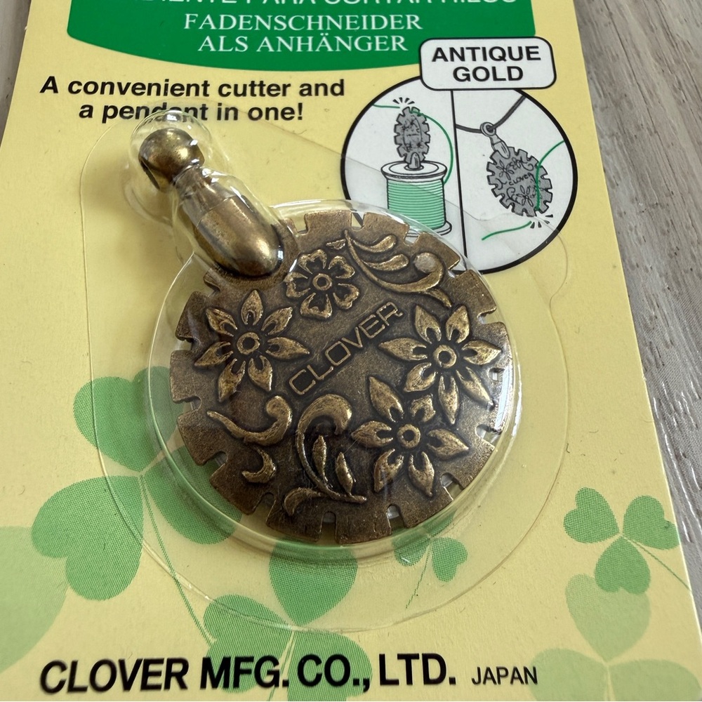 Clover Thread Cutter Pendant in Antique Gold